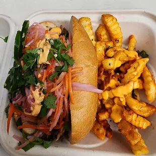 Pork banmi sandwich with Sriracha fries.