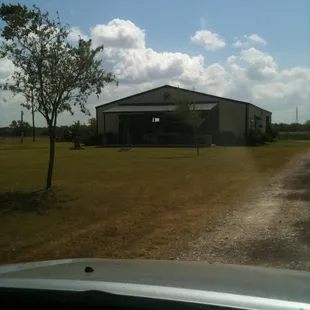 a large building in a field