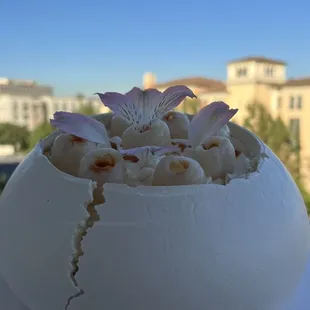 a white cake with flowers on top