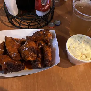 a plate of ribs and sides