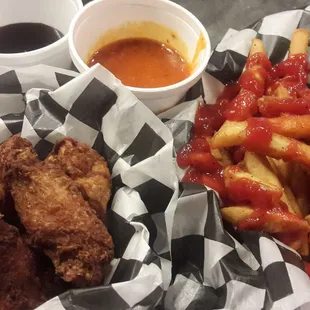 Chicken Wings and Crispy fries Hot sauce and Asian sauce- Ice cold beer! Bring your appetite. Wow!!!