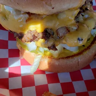 Small double cheese burger with grilled onions and mushrooms