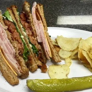 NEW Triple-Decker Club!Applewood-Smoked Bacon, crispy lettuce, and fresh tomatoes, piled high with Black Forest ham &amp; Oven-Roasted turkey.