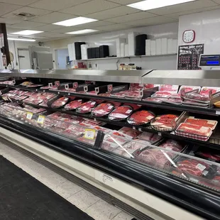 a meat section in a grocery store
