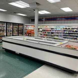 a refrigerated area in a grocery store