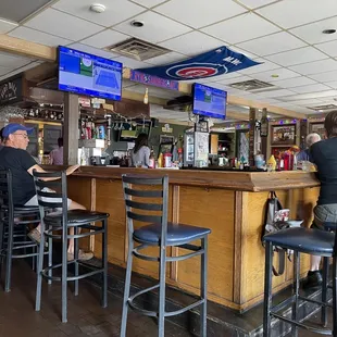 customers sitting at the bar