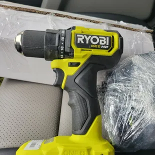 Ryobi drill, battery, and charger