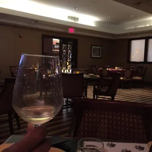 The front door with a glass of wine.