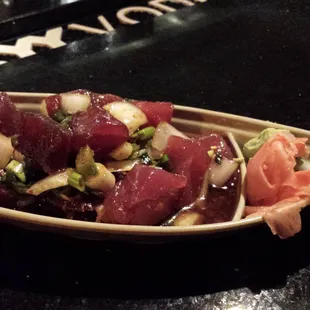 Poki:  Ahi Tuna with soy sauce, onions, sea salt and red pepper flakes