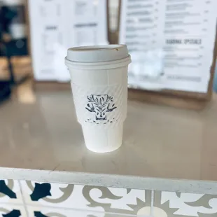 a coffee cup on a counter