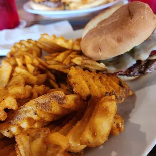 Burger w/bacon and waffle fries.