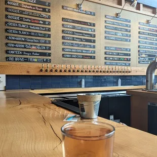 a pint of beer on the bar