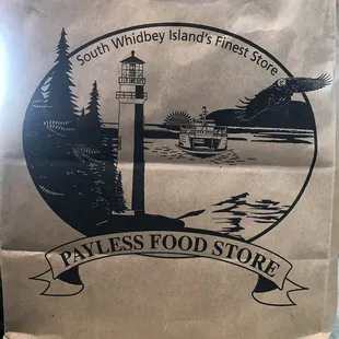 a paper bag with a picture of a lighthouse