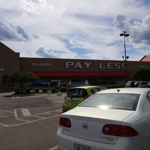 parking lot with cars in front