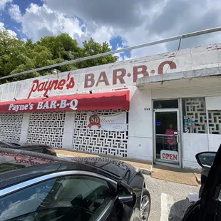 ows a car parked in front of the building