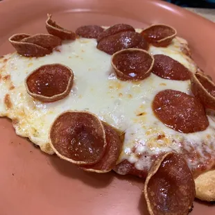 Individual slice of pepperoni