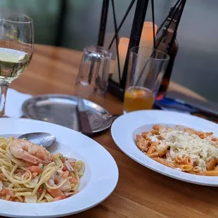 Shrimp scampi with linguini, penne and vodka sauce with chicken