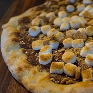 a pizza topped with marshmallows