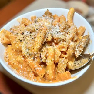 Penne Ala Rustica|fresh penne, house made pan sausage, suga Rosa sauce