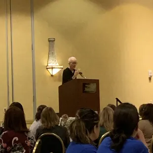 NM State Representative Gail Chasey receiving an award and sharing some words at the 6th Annual Abuse Prevention Luncheon Fundraiser.