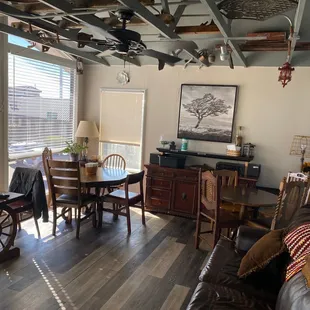 One of the two rooms where you can sit and dine. It's very cosy and bright.