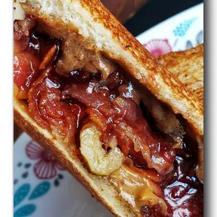 Walnut, almond butter, strawberry,  jalapeño, and bacon Pb&amp;j.