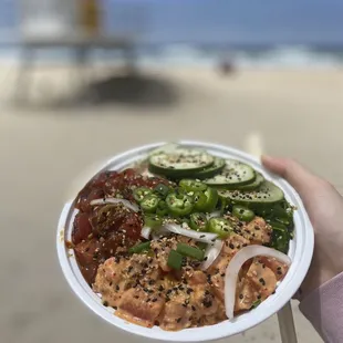 a person holding a plate of food