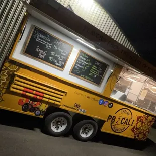 a food truck parked in front of a building
