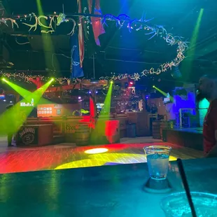 a man standing at a bar