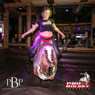  a woman riding a horse