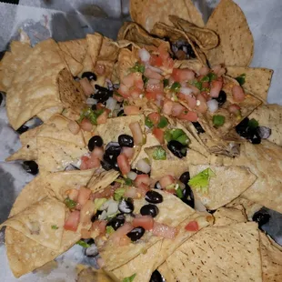 Nachos with no cheese sauce or cheese blend... vegan choice for my friend