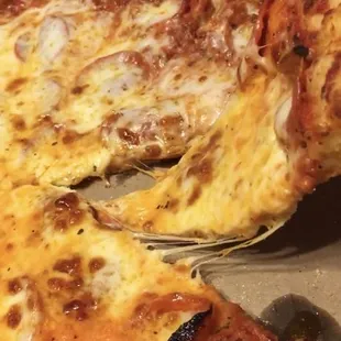 The pepperoni extra cheese is so cheesy and so good!!!