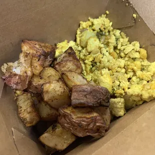 Potatoes and tofu scramble from hot foods area.