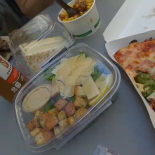 pizza, salad, and fries