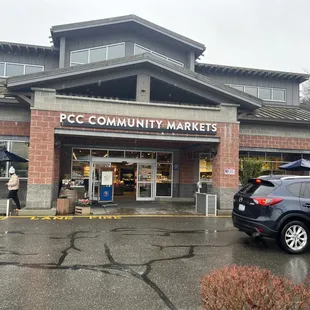 a car parked in front of the store