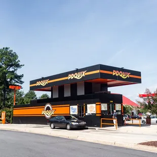 a car parked in front of a restaurant