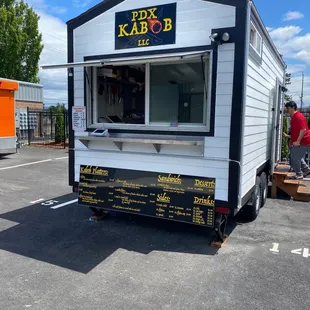 a food truck parked in a parking lot