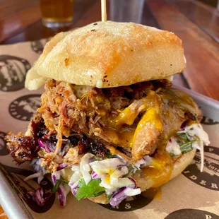 Burlington Slider with Pecan-smoked Pork, Carolina Mustard BBQ Sauce, Creamy Slaw, and Aioli on Ciabatta - PDX Sliders