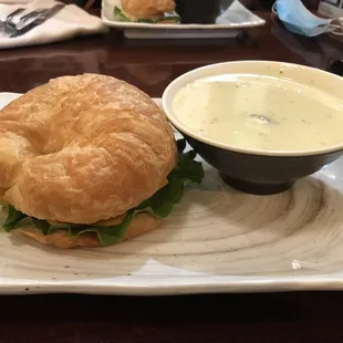 Tuna salad sandwich on a croissant with famous Broccoli Cheddar soup