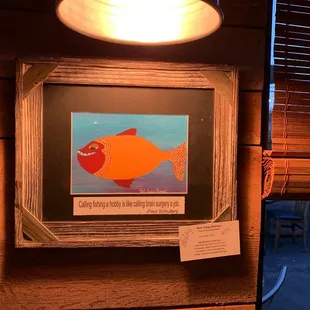 a framed picture of a fish