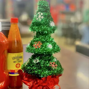 LOVE! Merry Christmas! Adorable Christmas Trees on all the tables OuiOui.