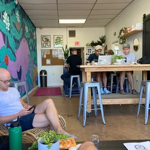 Mural, seating, interior, ambiance, vibes, toned legs, ceiling tile aesthetic