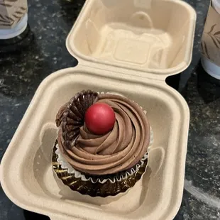 A bit dense but very good triple chocolate cake.