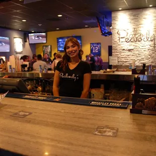 Our main bar at Peabody's with friendly staff.