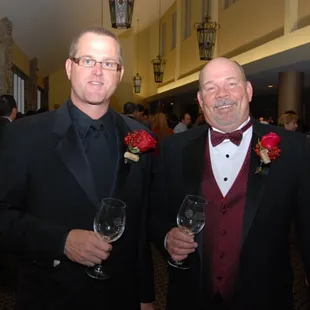 two men in tuxedos
