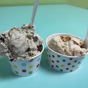 two cups of ice cream with spoons