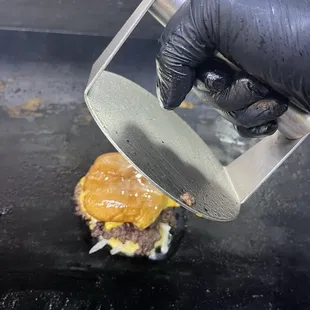 A double smash - Smash Burger A whole single patty hamburger being smashed into a patty of its own! This is an off menu item. IFYKYK