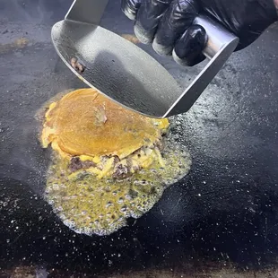 A double smash - Smash Burger A whole single patty hamburger being smashed into a patty of its own! This is an off menu item. IFYKYK
