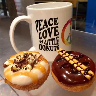 two doughnuts on a table