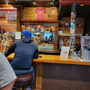 a man sitting at a bar